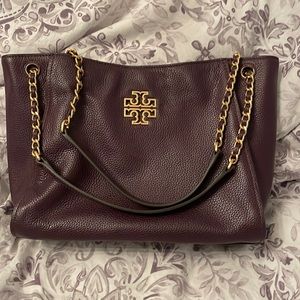 Tory Burch purse. Color is eggplant. In excellent condition.
